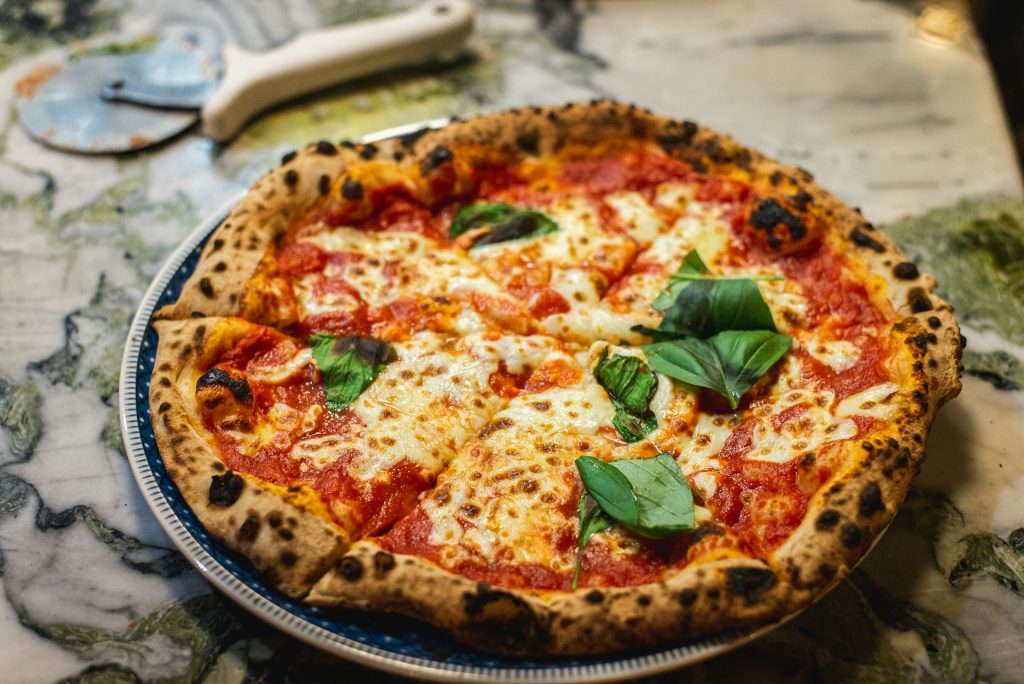 L&rsquo;art de la pizza, de la finesse parisienne à la générosité américaine